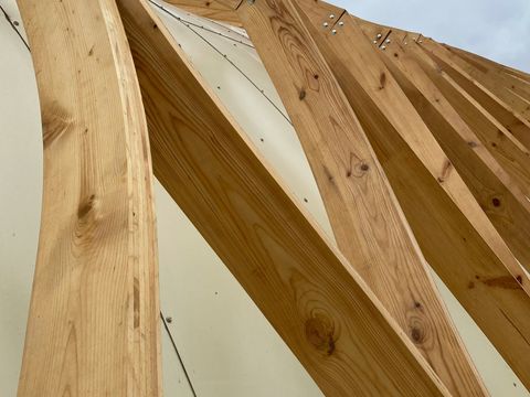 Oak frame structure mid-installation showing craftwork and joinery